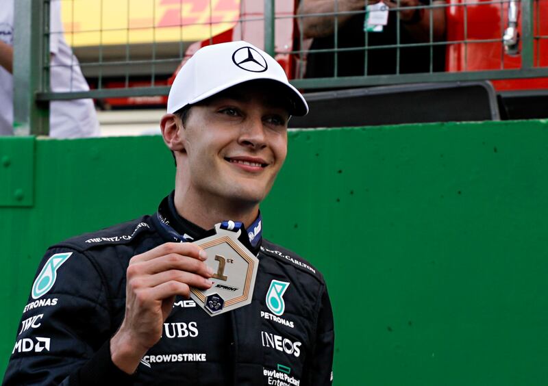 Mercedes driver George Russell, of Britain, celebrates winning the Sprint Race qualifying session at the Interlagos racetrack, in Sao Paulo, Brazil, Saturday, Nov.  12, 2022.  The Brazilian Formula One Grand Prix will take place on Sunday.  (AP Photo / Marcelo Chello)