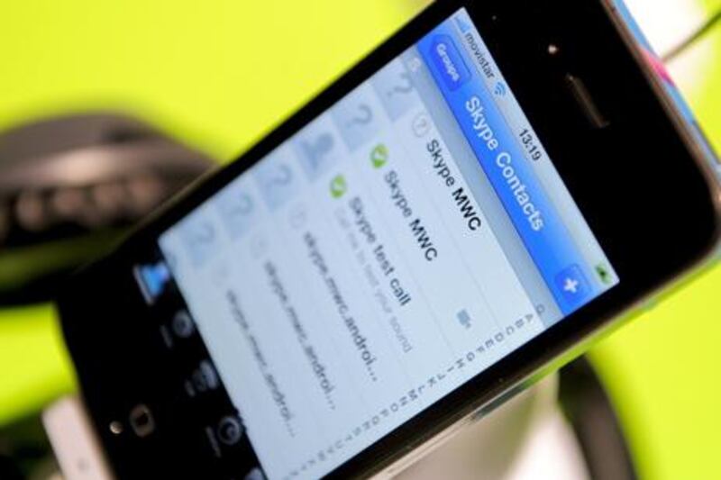 A mobile phone shows a Skype application at the 3GSM World congress in Barcelona, on February 14, 2011. The 2011 Mobile World Congress will be held from 15 to 18 February in Barcelona. AFP PHOTO/JOSEP LAGO

