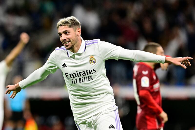 Federico Valverde celebrates after scoring Real Madrid's third goal against Sevilla. AFP