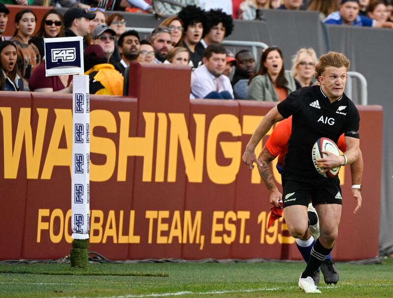 Damian McKenzie of the All Blacks runs with the ball. AFP