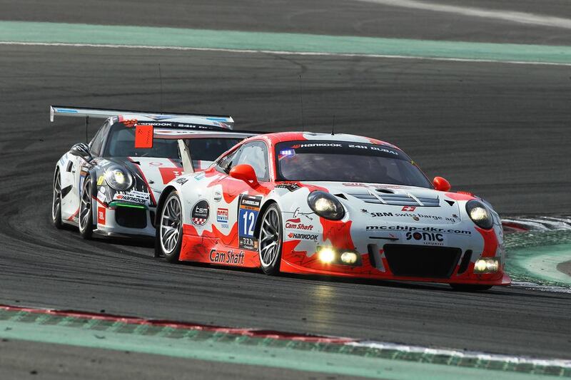 Manthey Racing’s Porsche 991 GT3 R, right,  at the Dubai 24 Hours race on Saturday, January 14, 2016. Courtesy