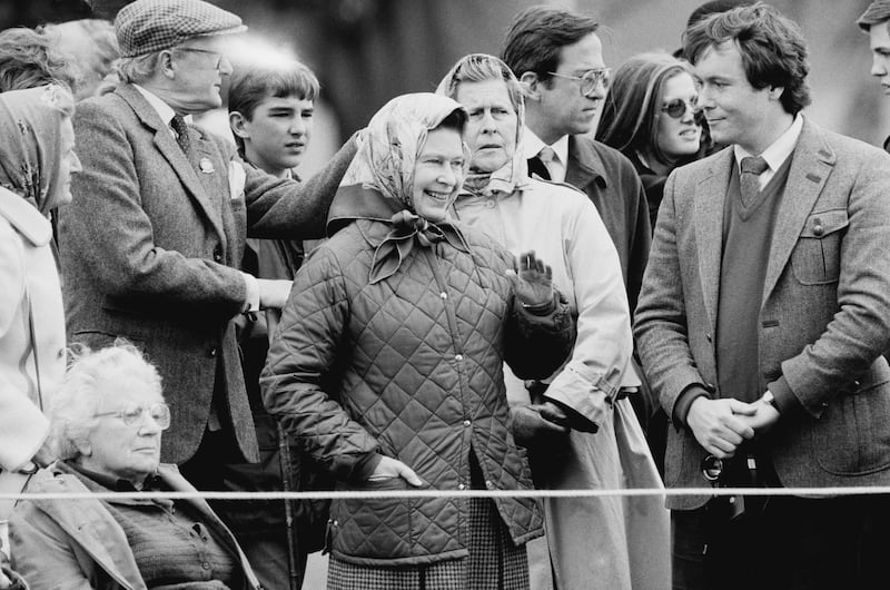Queen Elizabeth II in the crowd, watching the Carriage Driving event, at the Windsor Horse Show, UK, 12th May 1984. (Photo by Butler/Daily Express/Hulton Archive/Getty Images)