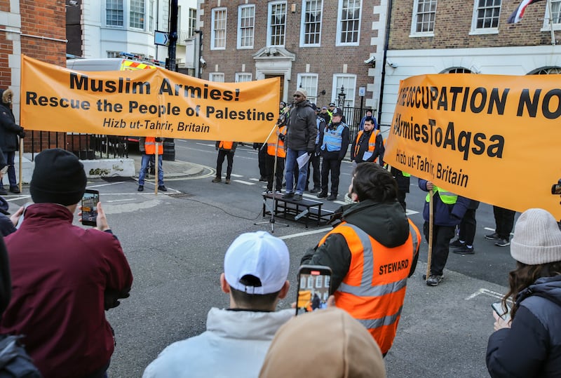 Hizb ut-Tahrir supporters gather outside the Egyptian embassy in London on November 25. Getty Images