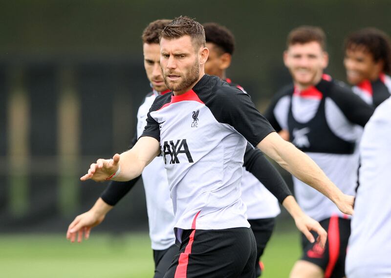 Liverpool's James Milner and Diogo Jota during training. Reuters