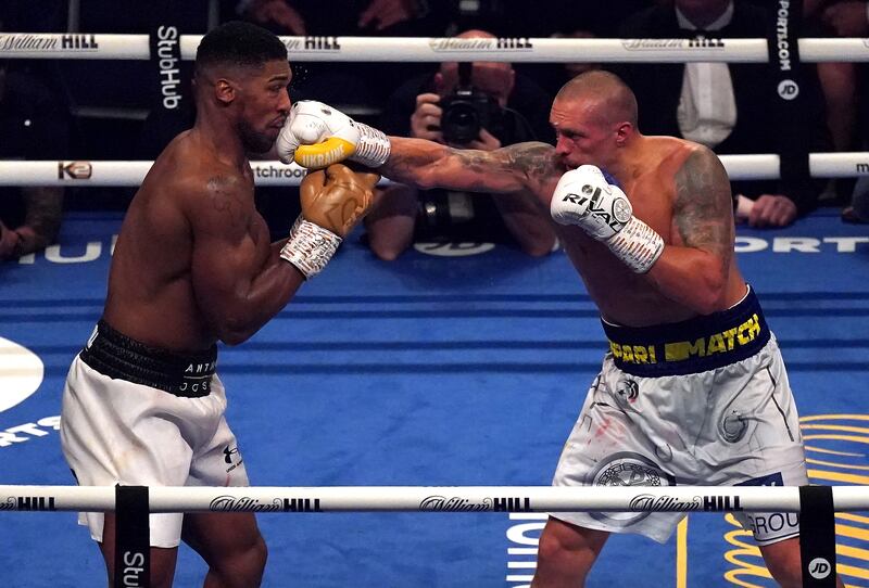 Oleksandr Usyk lands a puch on Anthony Joshua during his their fight at Tottenham Hotspur Stadium on Saturday, September 25. PA