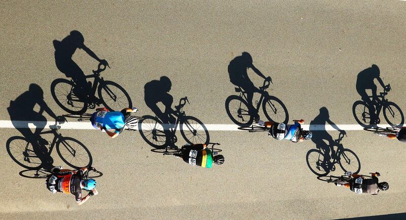 Shadows are cast by cyclists during the Cycling Road Race Test Event along Currumbin Bay in the Gold Coast, Australia. Scott Barbour / Getty Images