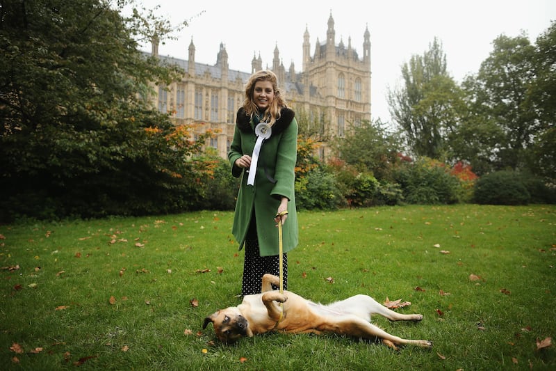 Ms Mordaunt with her Labrador cross Penny Lane, during the Westminster Dog of The Year competition in 2012. Getty Images