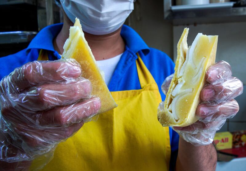 Buko pie is a traditional Filipino dessert, which consists of creamy coconut filling inside a flaky pie crust. It is made with buko, the flesh of a young coconut, sweetened with plain or condensed milk, cream and sugar. It's particularly popular at Pan Pugon TinaPIE Bakeri.