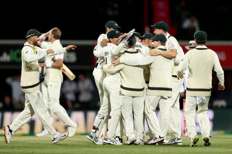 Australia players celebrate their 146-run victory over England. Getty