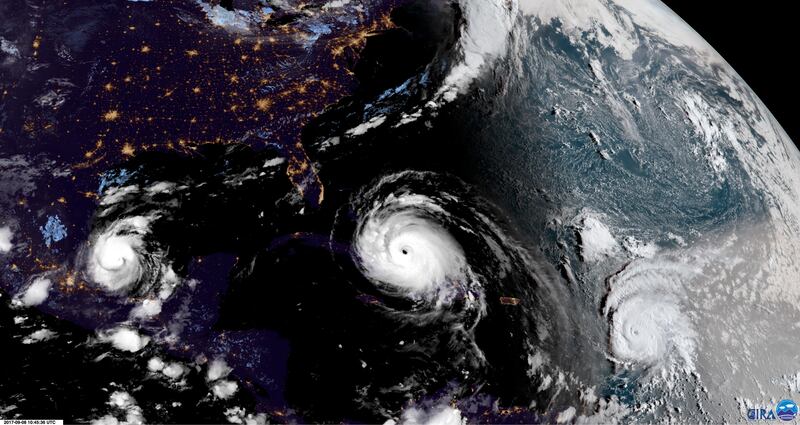 In this geocolor image GOES-16 satellite image taken Friday, Sep. 8, 2017, at 10:45 UTC, Hurricane Irma, center, approaches Cuba and Florida, with Hurricane Katia, left, in the Gulf of Mexico, and Hurricane Jose, right, in the Atlantic Ocean. Cuba evacuated tourists from beachside resorts and Floridians emptied stores of plywood and bottled water after Hurricane Irma left at least 20 people dead and thousands homeless on a devastated string of Caribbean islands and spun toward Florida for what could be a catastrophic blow this weekend.  (NOAA via AP)