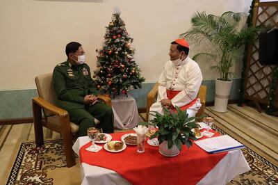 Cardinal Charles Bo attends a Christmas event with Myanmar's junta chief Min Aung Hlaing in Yangon. Myanmar Military Information Team / AFP