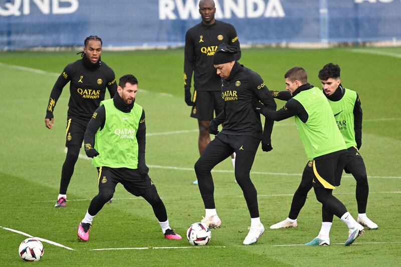 Kylian Mbappe during training with Marco Verratti and Lionel Messi. AFP