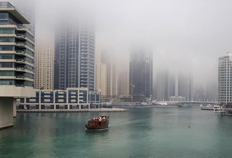 Afternoon fog descends on Dubai Marina on March 15, 2013. Sarah Dea / The National