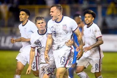 USA's Christian Pulisic (C) and Jordan Morris celebrate a goal against El Salvador during their Concacaf Nations League football match at the Cuscatlan Stadium, in San Salvador, on June 14, 2022.  (Photo by MARVIN RECINOS  /  AFP)