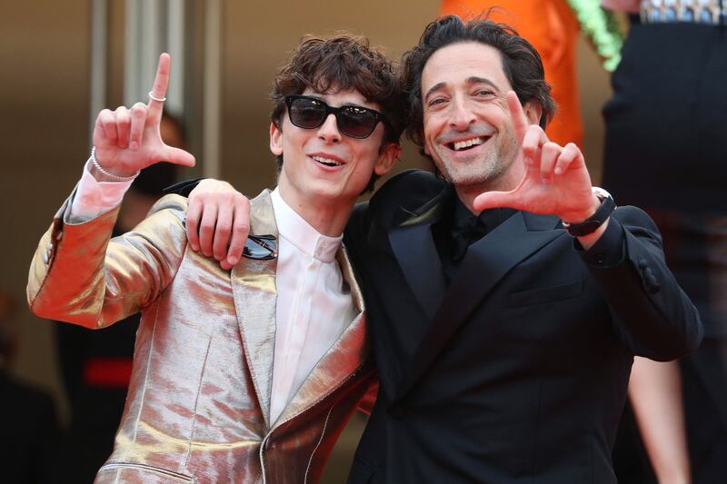 Timothee Chalamet and Adrien Brody attend the screening of 'The French Dispatch' at the 74th annual Cannes Film Festival on July 12, 2021