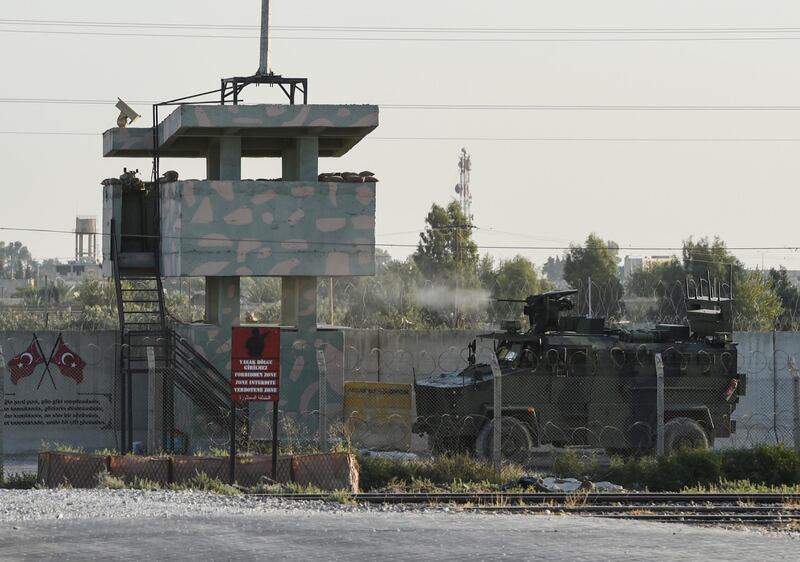 A Turkish military armoured vehicle fires towards the Syrian town of Tal Abyad from the Turkish side of the border in Akcakale, Turkey. The military action is part of a campaign to extend Turkish control of more of northern Syria, a large swath of which is currently held by Syrian Kurds, whom Turkey regards as a threat. U.S. President Donald Trump granted tacit American approval to this campaign, withdrawing his country's troops from several Syrian outposts near the Turkish border. Getty Images