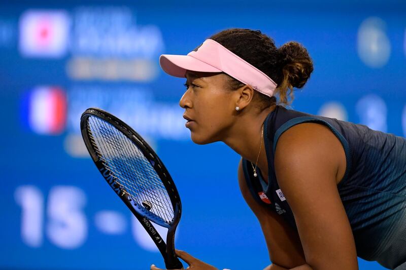 Naomi Osaka waits for a serve from Kristina Mladenovic. AP Photo