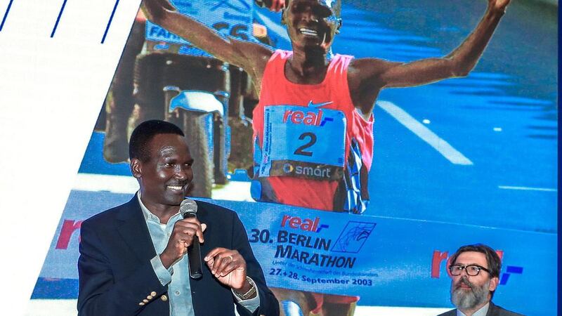 Paul Tergat, left, talks during the unveiling of the course for the inaugural Adnoc Abu Dhabi Marathon in September. Victor Besa / The National
