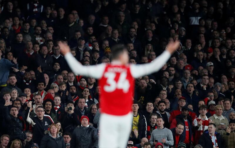 Soccer Football - Premier League - Arsenal v Crystal Palace - Emirates Stadium, London, Britain - October 27, 2019  General view of fans inside the stadium as Arsenal's Granit Xhaka is substituted       REUTERS/David Klein  EDITORIAL USE ONLY. No use with unauthorized audio, video, data, fixture lists, club/league logos or "live" services. Online in-match use limited to 75 images, no video emulation. No use in betting, games or single club/league/player publications.  Please contact your account representative for further details.     TPX IMAGES OF THE DAY