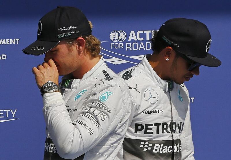 Nico Rosberg, left, leads Mercedes-GP teammate Lewis Hamilton, right, by 22 in the F1 drivers' championship standings. Yves Herman / Reuters