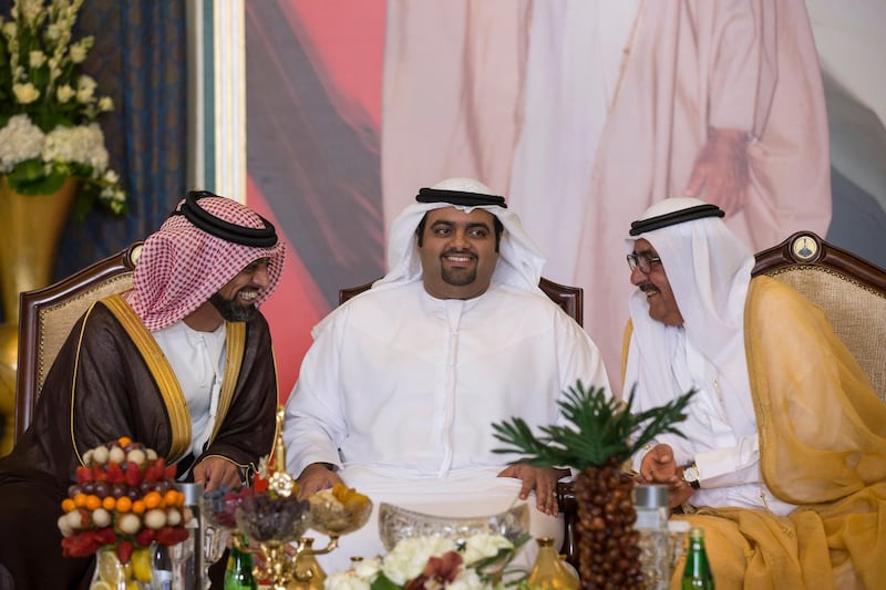 ABU DHABI, UNITED ARAB EMIRATES - March 23, 2016: (L-R) HH Sheikh Ammar bin Humaid Al Nuaimi, Crown Prince of Ajman, HH Sheikh Mohamed bin Hamad Al Sharqi, Crown Prince of Fujairah, and HH Sheikh Hamdan bin Rashid Al Maktoum, Deputy Ruler of Dubai and UAE Minister of Finance, attend the mass wedding reception of HH Sheikh Ahmed bin Nasser bin Zayed Al Nahyan (not shown), HH Sheikh Zayed bin Saeed bin Zayed Al Nahyan (not shown), and other grooms at Armed Forces Officers Club. 
( Ryan Carter / Crown Prince Court - Abu Dhabi ) *** Local Caption ***  20160323RC_C069170.jpg