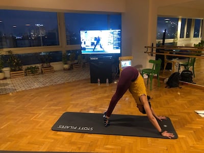 itness instructor Sarah Helmy leading a workout on the video conference application Zoom at her Nile-side studio in Cairo. Photo by Abu Bakr Shaaban