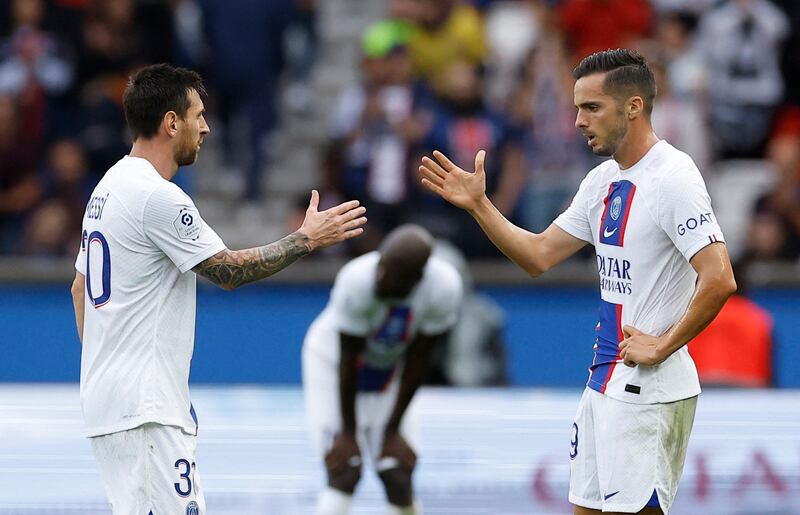 Soccer Football - Ligue 1 - Paris St Germain v Brest - Parc des Princes, Paris, France - September 10, 2022 Paris St Germain's Lionel Messi and Fabian Ruiz celebrate after the match REUTERS / Christian Hartmann