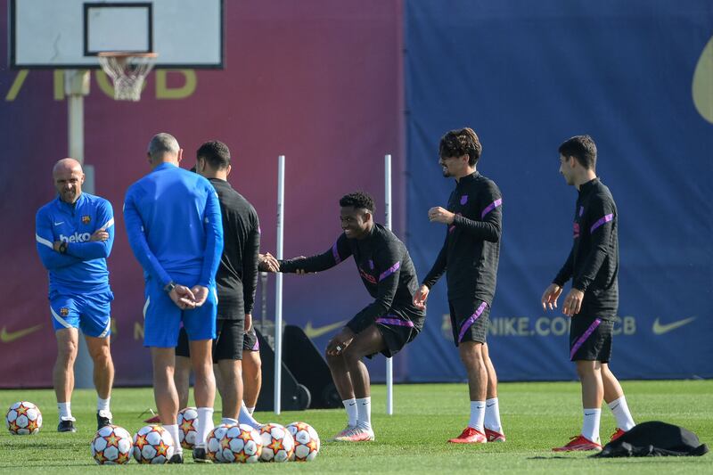 Barcelona's Ansu Fati and teammates take part in a training session. AFP