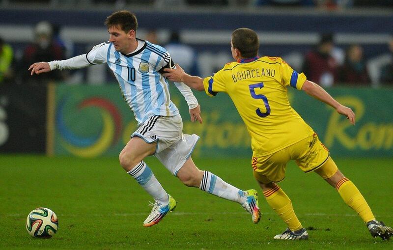 Lionel Messi and Argentina drew Romania 0-0. They'll play in Group F at the 2014 World Cup with Bosnia and Herzegovina, Iran and Nigeria. Daniel Mihailescu / AFP