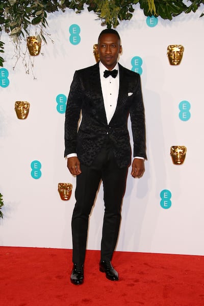Actor Mahershala Ali poses for photographers upon arrival at the BAFTA awards in London, Sunday, Feb. 10, 2019. (Photo by Joel C Ryan/Invision/AP)