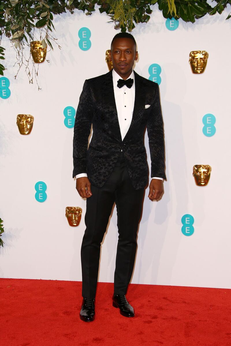 Actor Mahershala Ali poses for photographers upon arrival at the BAFTA awards in London, Sunday, Feb. 10, 2019. (Photo by Joel C Ryan/Invision/AP)