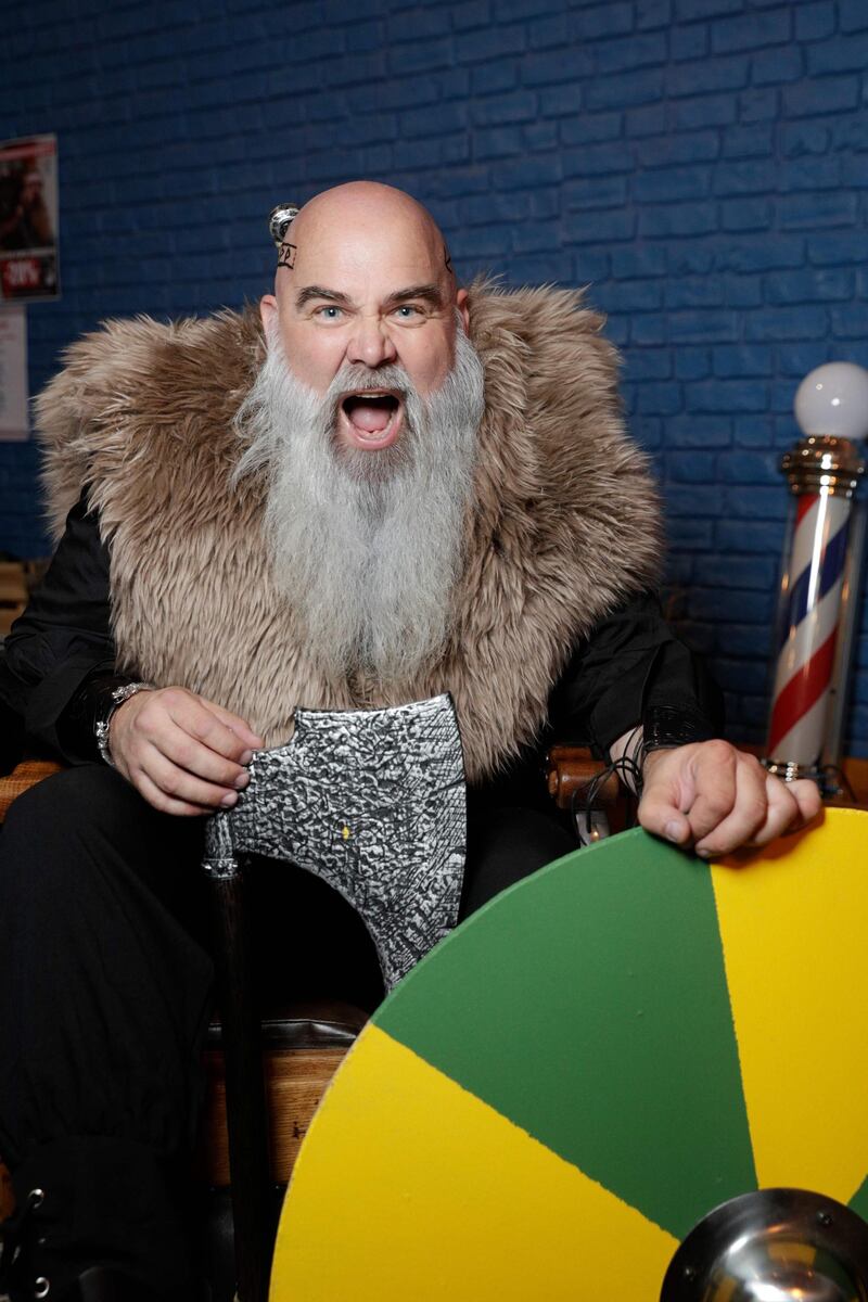 A contestant poses as he takes part in the third edition of the French Beard Championships in Paris. AFP