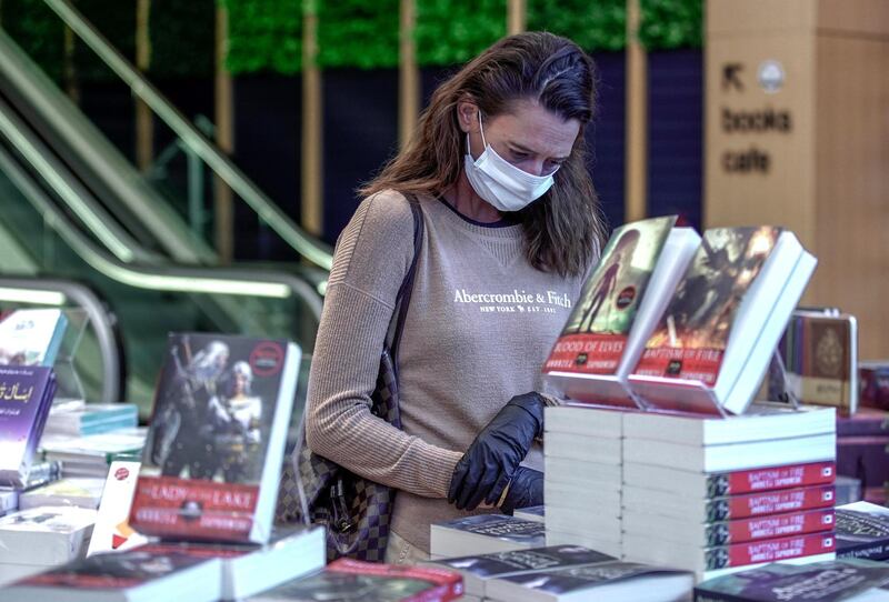 Abu Dhabi, United Arab Emirates, May 10, 2020.  
Book lovers at the newly opened Kinokuniya book shop at the Galleria Mall, Al Maryah Island, Abu Dhabi.
Victor Besa/The National
Section:  NA
Reporter: