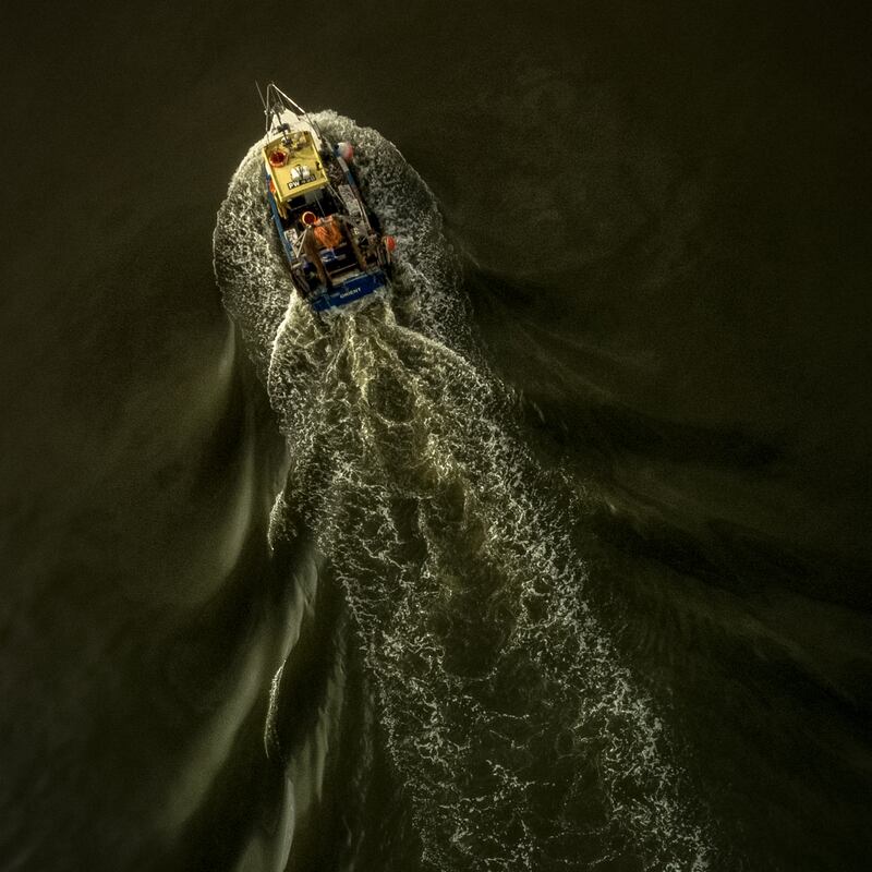 'The Fisherman's Wake', an aerial shot of a fishing trawler taken at Whitstable in Kent by Michael Marsh, is the Overall Winner in the 2021 Ultimate Sea View photography competition. PA