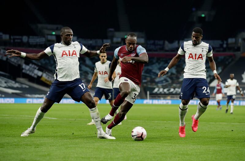 Spurs midfielder Moussa Sissoko challenges Michail Antonio of West Ham. Getty