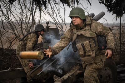 Ukrainian soldiers of the 71st Jaeger Brigade fire a M101 howitzer towards Russian positions near Avdiivka. AP