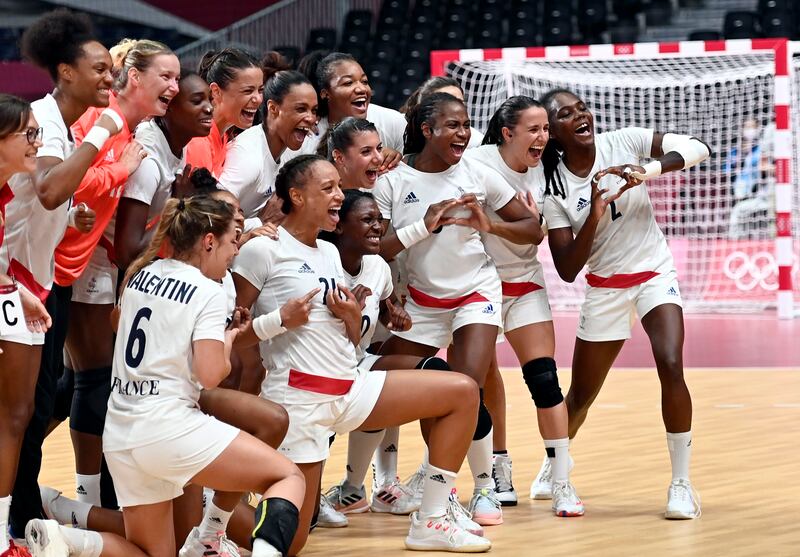 Players of France celebrate winning the gold medal after winning the Women's Handball Gold Medal match against Team ROC.