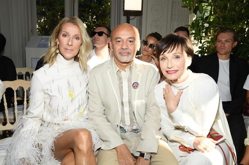 Celine Dion, Christian Louboutin and Kristin Scott Thomas attend the Valentino show on July 3, 2019 in Paris, France. Getty Images