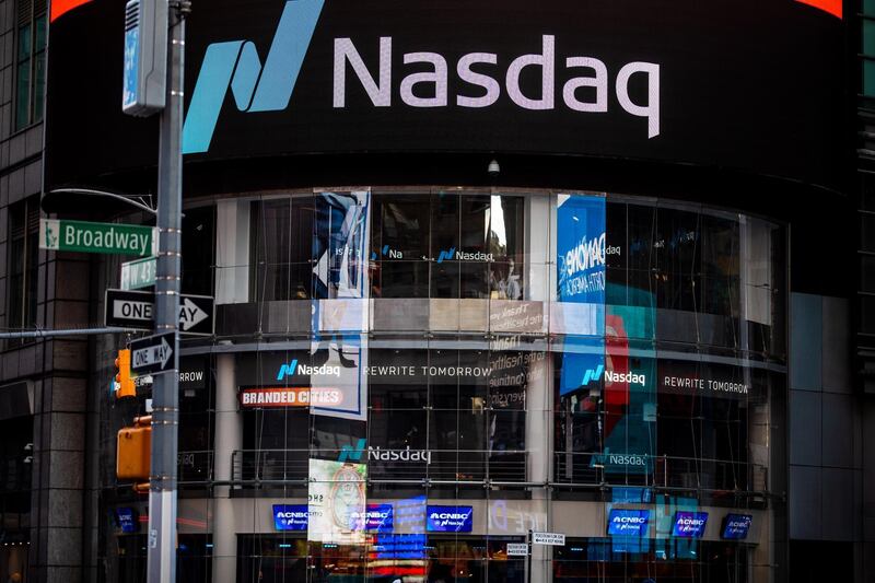 Signage is displayed outside the Nasdaq Market Site in the Times Square area of New York, U.S., on Tuesday, May 12, 2020. New York City's lockdown is likely to continue into June, Mayor Bill de Blasio said Monday at a press briefing. The state has been under lockdown since March in an attempt to stop the spread of the novel coronavirus. Photographer: Demetrius Freeman/Bloomberg