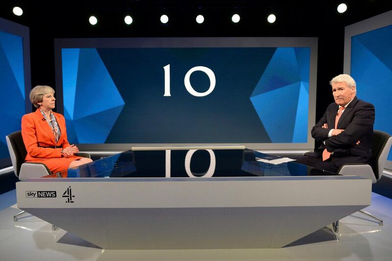 Mrs May, left is interviewed by broadcaster Jeremy Paxman, during a general election broadcast, in London on May 29, 2017/ Pool Photo via AP, File