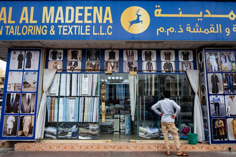 Tailoring shops in Dubai's Satwa neighbourhood come to life ahead of Eid. Antonie Robertson / The National