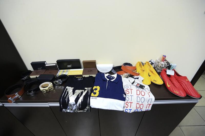 Counterfeit designer goods seized by Dubai Customs in Jebel Ali Port. Sarah Dea / The National