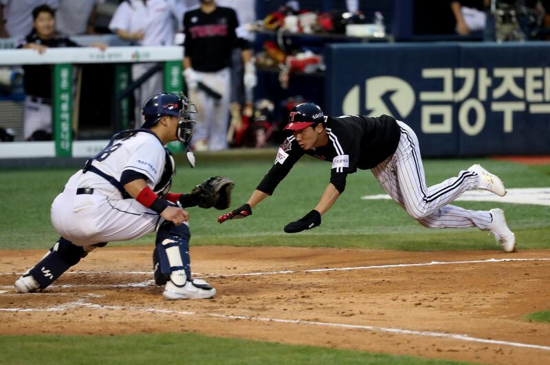 Infielder Kim Yong-Eui LG Twins slides into home base at the Jamsil Stadium on Sunday. Getty