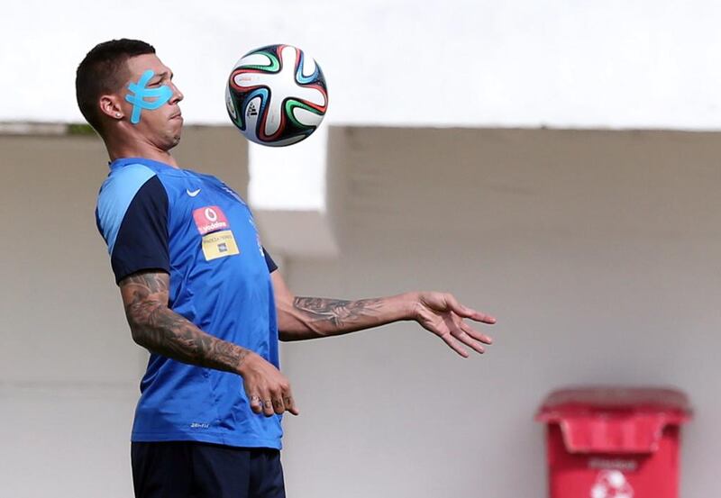 Greece’s defender Jose Holebas controls the ball during a training session at Aracaju, Brazil on June 27, 2014, two days before their 2 round of 16 football match against Costa Rica. Aris Messinis / AFP 