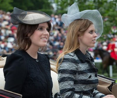 ASCOT -UK - 18 June 2013: Members of the Royal Family join HM Queen Elizabeth for the first day of racing at Royal Ascot in Berkshire. The Queen arrived by carriage with Prince Charles and Camilla, Duchess of Cornwall.
Princess Eugenie and Princess Beatrice (rt) arrives by carriage.Photograph by Ian Jones *** Local Caption ***  IJP-17-6-13-Royal-Ascot-20.jpg IJP-17-6-13-Royal-Ascot-20_4.jpg