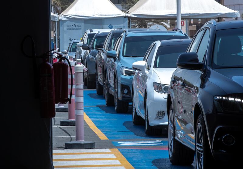 Residents are a big show for PCR and vaccination tests at the  SEHA Covid-19 Drive-Through Service Center at the Corniche in Abu Dhabi on June 17th, 2021.  There is a huge demand for vaccinations and PCRs after the green pass restrictions. Victor Besa / The National.
Reporter: Shireena Al Nowais for News