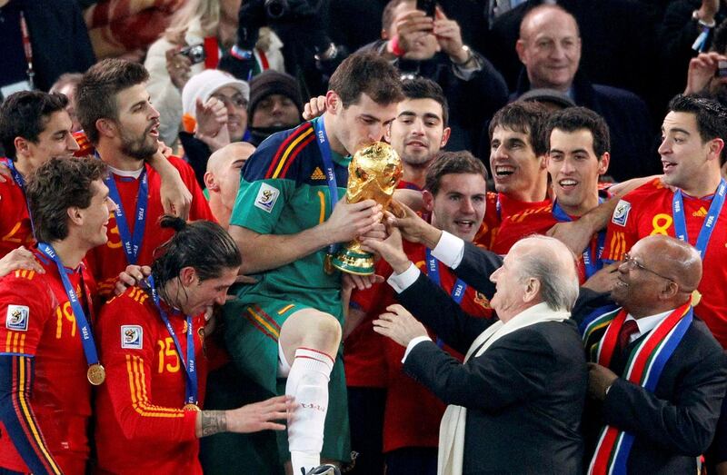 Iker Casillas is presented with the World Cup in 2010. Reuters