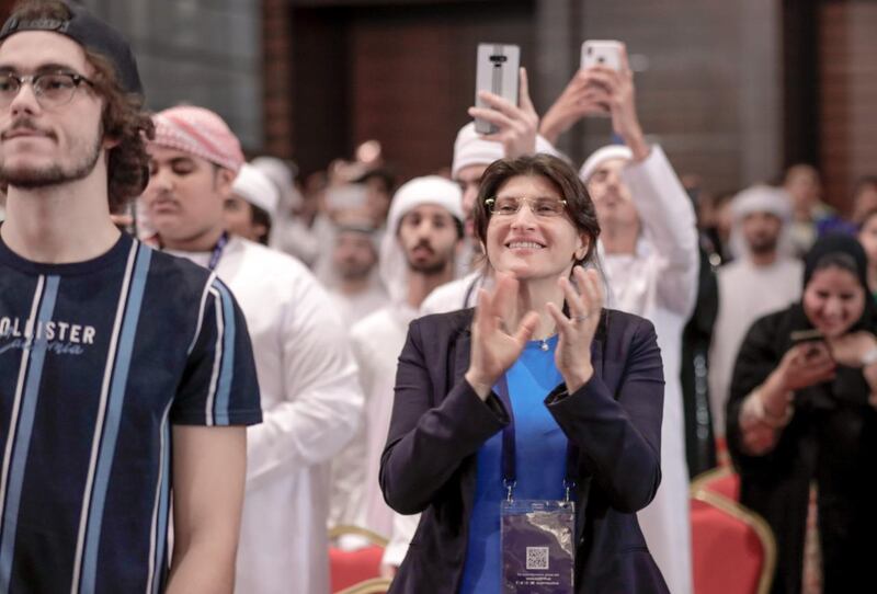 Crowds watch the launch of the Soyuz rocket, carrying Hazza Al Mansouri, into space, from Abu Dhabi National Exhibition Centre. Victor Besa / The National 