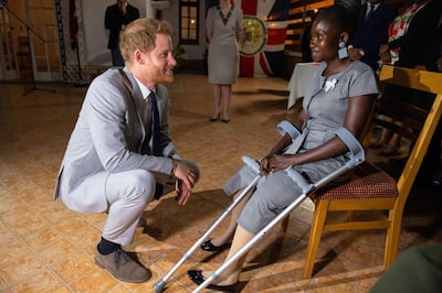 epa07875702 Britain's Prince Harry, Duke of Sussex meets landmine victim Sandra Tigica, who Princess Diana met on her visit to Angola 1997, at a reception at the British Ambassadors Residence in Luanda, Angola, 27 September 2019. Prince Harry visited The Halo Trust landmine clearance charity. The Duke and Duchess of Sussex are on a 10-day tour of southern Africa.  EPA/DOMINIC LIPINSKI / POOL
