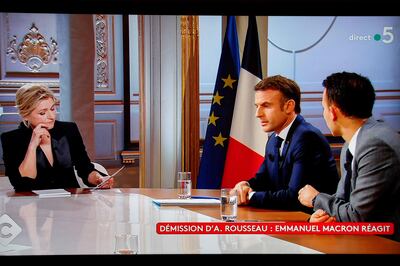 French President Emmanuel Macron speaks with French journalist Anne-Elisabeth Lemoine. AFP